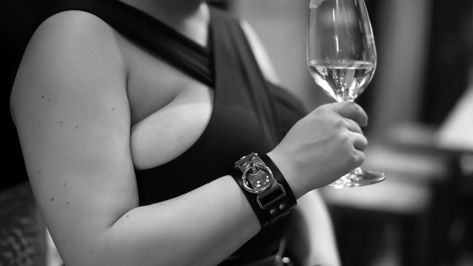 Bracelet and wine glass; SFW crop